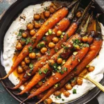 Spicy maple roast carrots with crispy chickpeas and yogurt sauce
