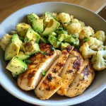 Pan-Seared Chicken with Steamed Cauliflower & Avocado Bowl